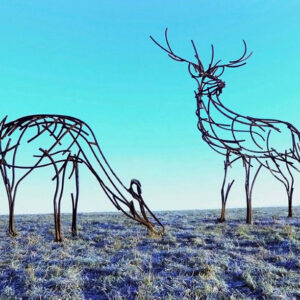 A stag and doe grazing on the Moors metal wildlife sculpture by Andrew Kay Sculpture